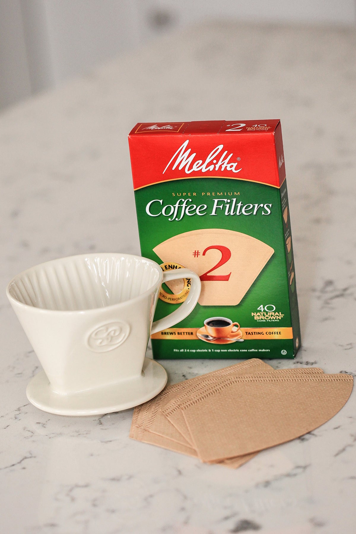 Simply Charmed ceramic pour-over with Melitta filters—quick start to rich flavor.