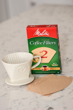 Simply Charmed ceramic pour-over with Melitta filters—quick start to rich flavor.