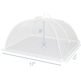 Simply Genius mesh tents shielding food on an outdoor table setup