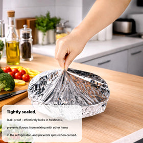 Sinbana reusable aluminum foil cover protects leftovers and meals.