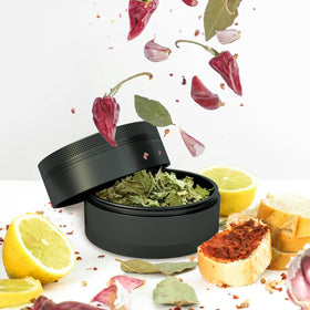SKROM MYP grinder in action grinding spices and dried herbs