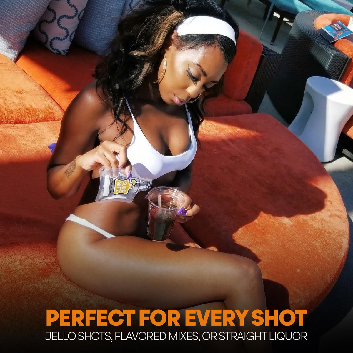 Slick Shotz 3oz liquor pouch at beach party, ideal for casual gatherings.