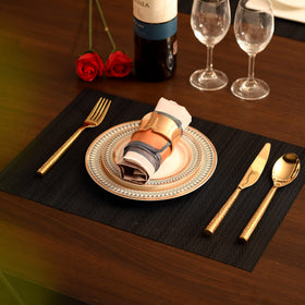 SLKQG black placemats set packaging, flat-pack delivery ensures mats arrive unrolled.