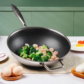 SLOTTET wok is oven-safe up to 500F for finishing dishes.