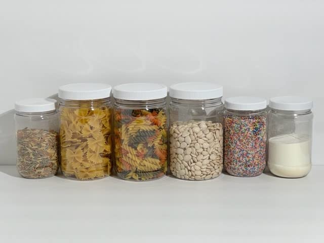 SMART SOLUTIONS jar with herbs and spices for convenient kitchen organization.