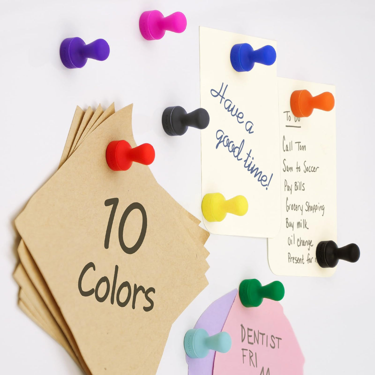 Smart&Cool magnets holding photos and notes on a fridge surface