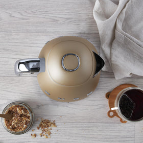Smeg KLF03 kettle with soft-opening lid for safer steam release.