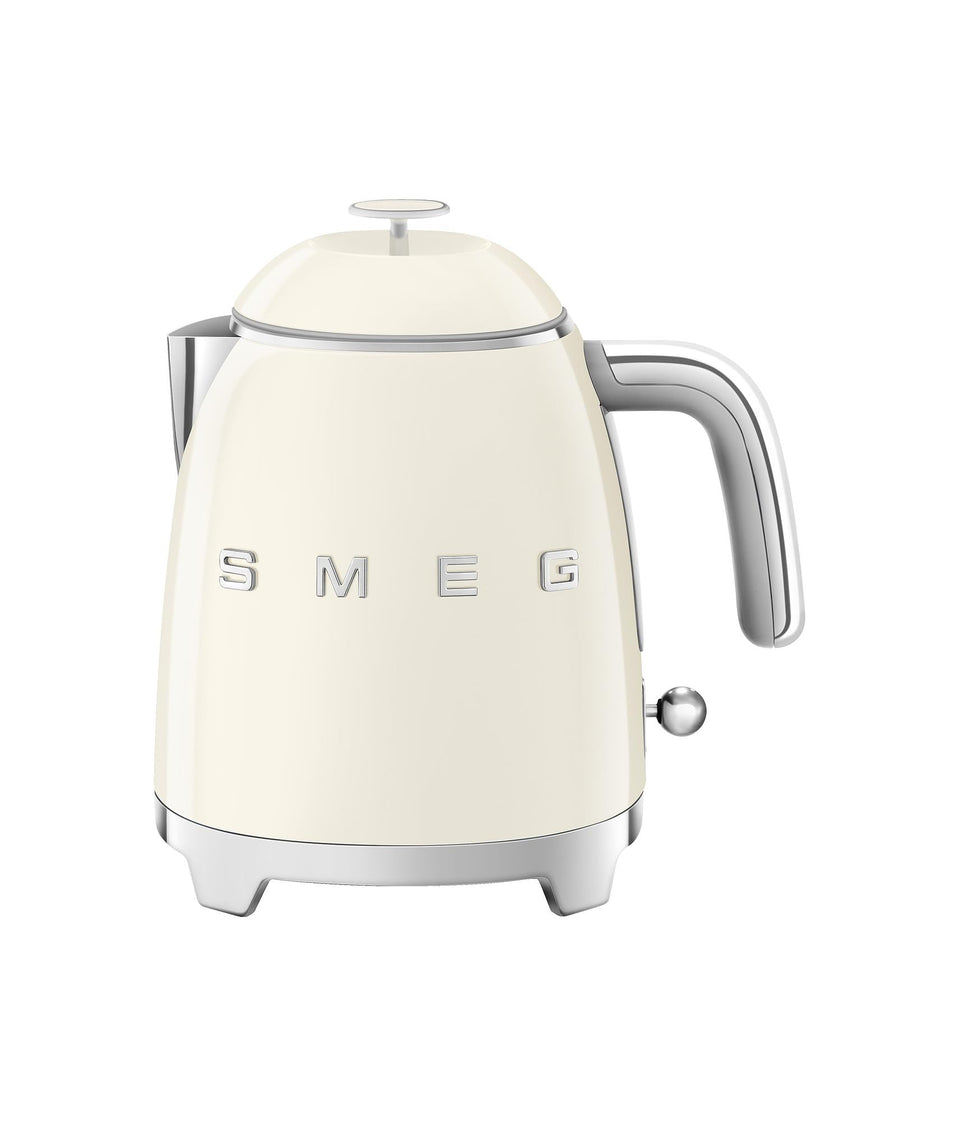 Smeg Mini 50's Cream kettle front view showcasing retro design and compact 0.8L capacity.