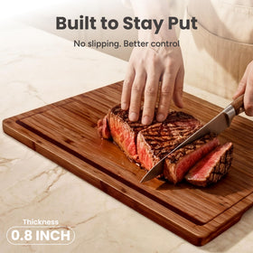 SMIRLY bamboo board with deep juice grooves to catch liquids during prep
