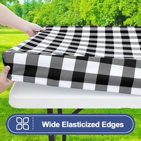 Smiry elastic-edge-fit tablecloth secured on a 6ft rectangle table in windy settings.