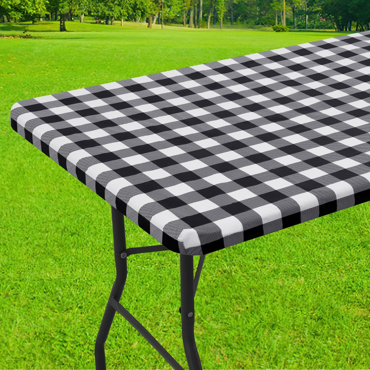 Smiry rectangle picnic tablecloth on a table shows waterproof surface for easy cleanup.