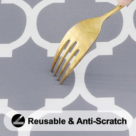 Smiry Moroccan-patterned tablecloth protects tabletop while brightening the setting.