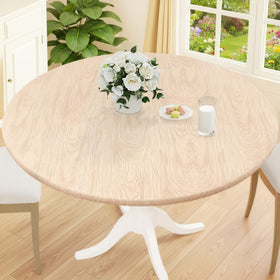 Smiry elastic-edge round tablecloth secures a snug fit on 68x57 inch tables.