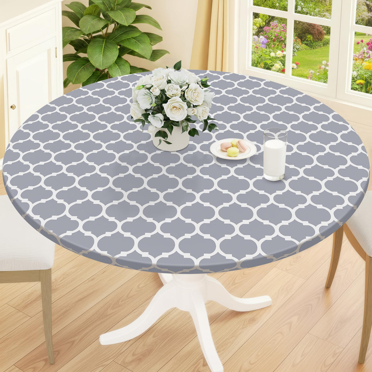 Smiry round tablecloth with elastic-fit secures a 40-inch table.