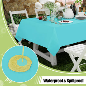 Smiry teal rectangular table cloth spread on a dining table outdoors