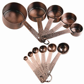 Smithcraft copper measuring cups set stacked neatly for quick baking prep.
