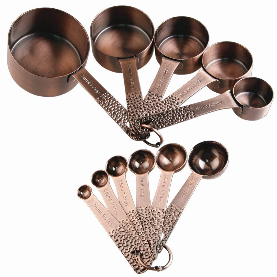 Smithcraft copper measuring cups set stacked neatly for quick baking prep.
