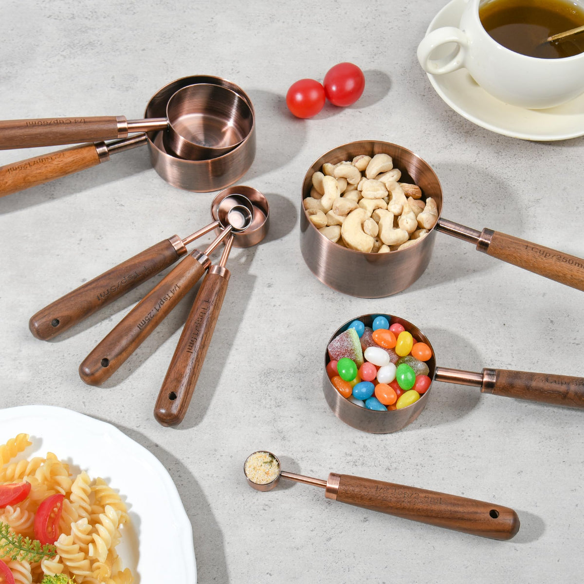Smithcraft copper measuring spoon 1-2tsp-2.5ml with wood handle for flexible seasoning.