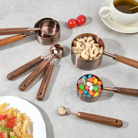 Smithcraft copper measuring spoon 1-2tsp-2.5ml with wood handle for flexible seasoning.