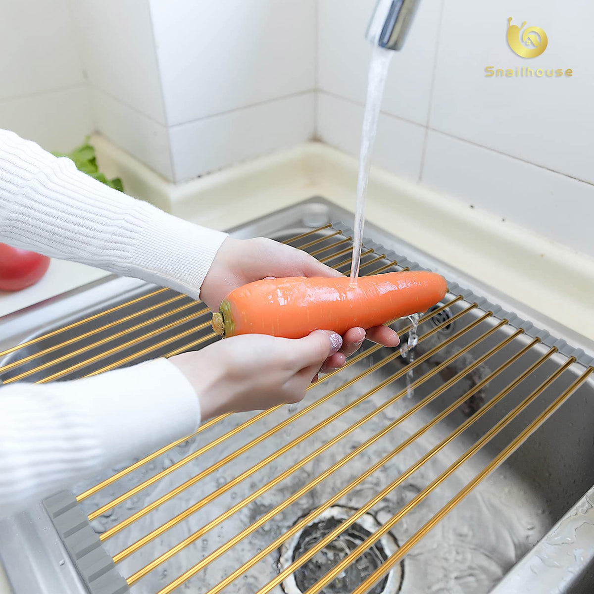 Snailhouse dish rack over-sink design highlights space-saving solution for counters.