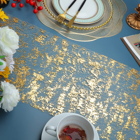 Snowkingdom gold mesh runner creates luxurious table accents for bridal showers.