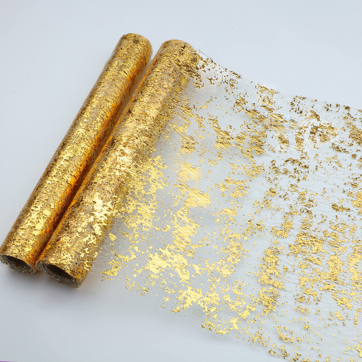 Snowkingdom gold table runner with sequin foil adds luxury shimmer to wedding tables.