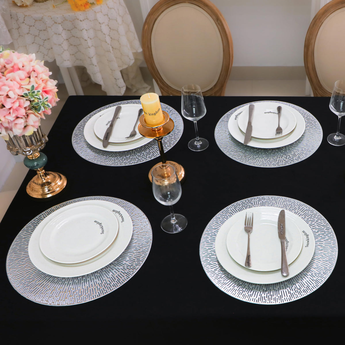 Snowkingdom pressed vinyl placemats in silver add subtle shine without staining.