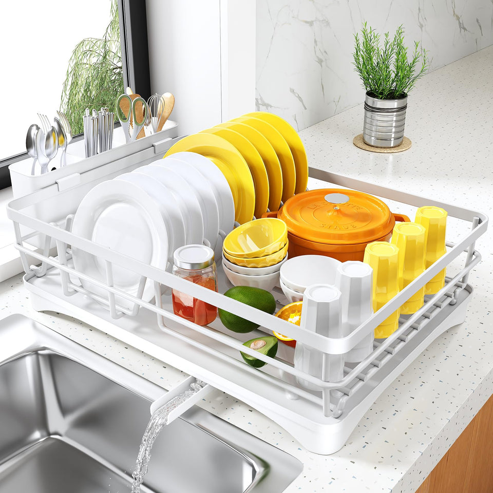 SNTD dish drying rack on counter with large capacity for quick air drying of dishes.