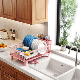 SNTD pink dish rack complements modern kitchen counters.