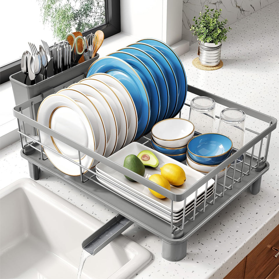 SNTD dish drying rack with angled drainboard directing water to the sink, reducing countertop moisture