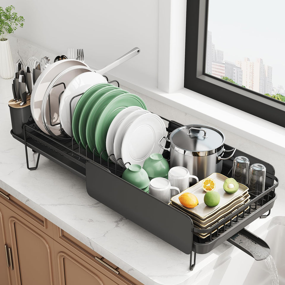 SNTD extendable dish drying rack on counter showing adjustable length for flexible space.