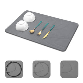 Snuggery large stone drying mat on counter with even moisture absorption.