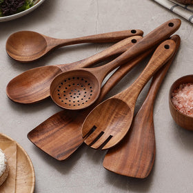 Snuvid teak spoons ergonomic handle for comfortable long cooking sessions.