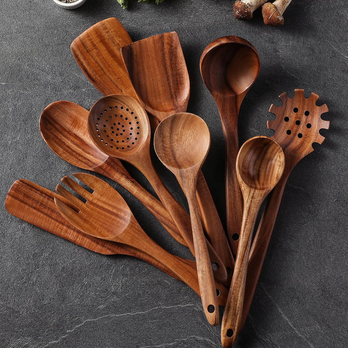 Snuvid teak spoons glide smoothly over nonstick surfaces.