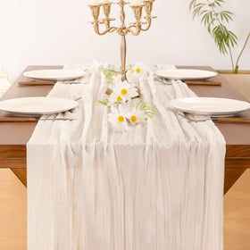 Socomi baby shower decor with ivory cheesecloth runner for delicate festive setting