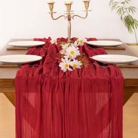 Socomi cheesecloth runner with reinforced stitched edges to prevent fraying.