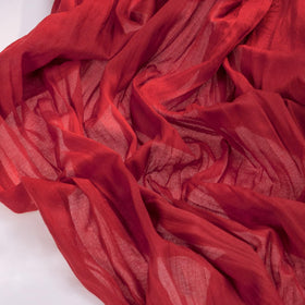 Socomi table runner close-up reveals rustic hand-dyed texture.