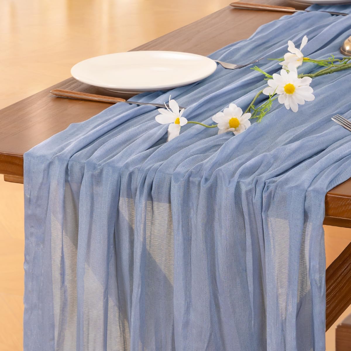 Socomi dusty blue cheesecloth table runner on wedding table for boho chic ambiance