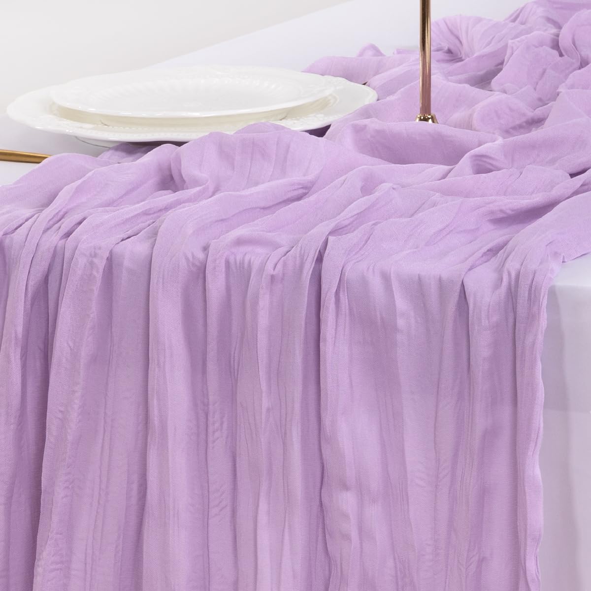 Socomi lavender cheesecloth runner at a baby shower table setting