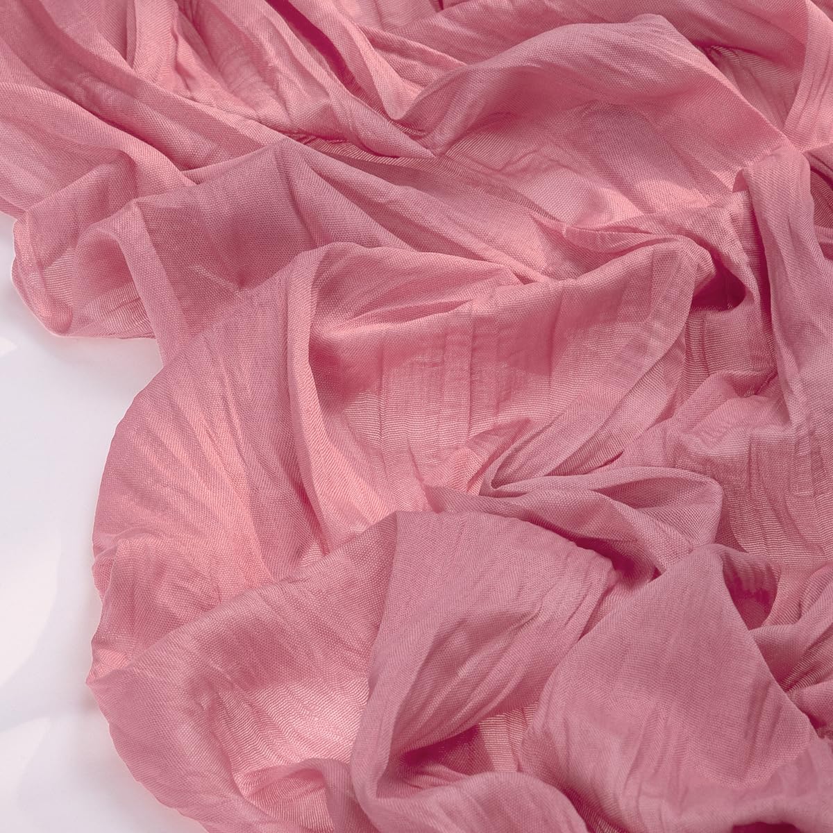 Socomi cheesecloth close-up texture showing soft weave and rustic charm.