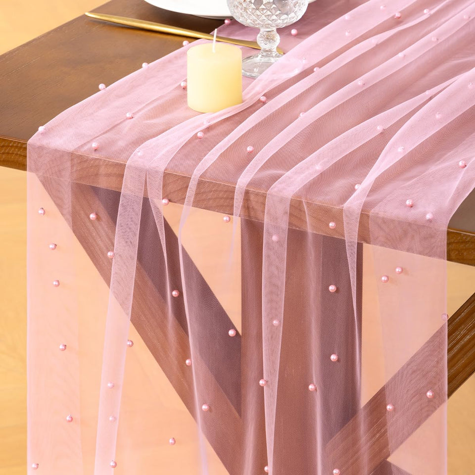 Socomi Pearl Table Runner in pink tulle enhances wedding and party tables with elegant texture.