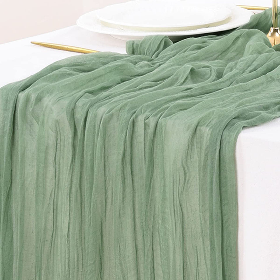 Socomi sage green cheesecloth table runner for wedding decor adds rustic elegance.