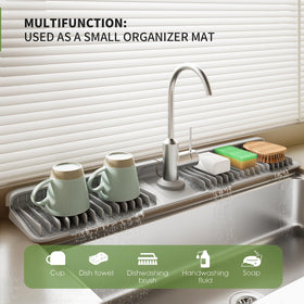 SOCORIA faucet mat with 7 degree slope promotes quick drainage.