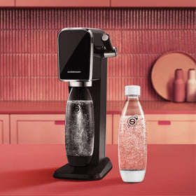 Sodastream slim-neck bottle white on countertop for elegant storage and on-demand fizz.