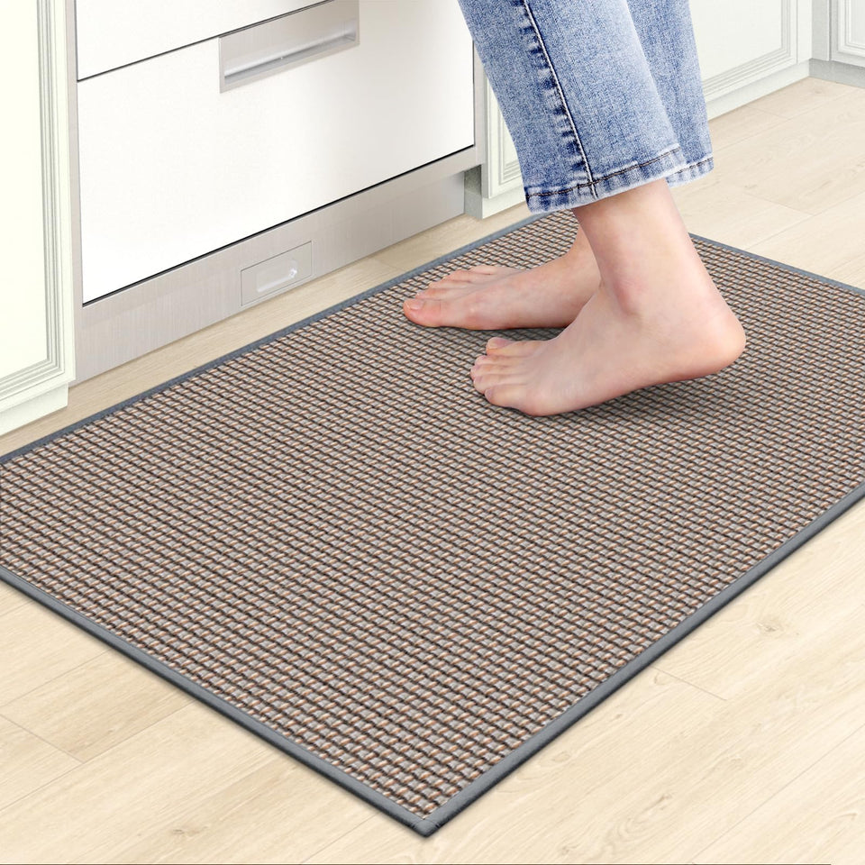 SoftDuo chenille absorbent kitchen mat for the front sink reduces spills.