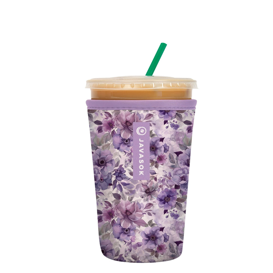 Sok It JavaSok lilac-meadows insulated sleeve on a cup keeps iced coffee cold with a soft grip.