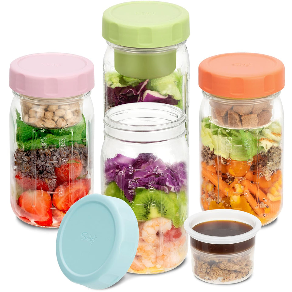 SOLIGT 4-pack glass salad jars with pink lids for fresh, organized lunches.