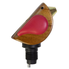 Songbird Specialties wine pourer perched on bottle for a playful pour