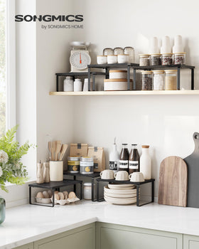 Songmics cabinet organizer shelf stackable design for flexible configurations.