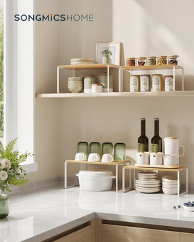 Songmics Home kitchen spice rack stackable helps keep spices within reach.